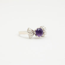 Ring with and amethystwith diamond (0.08 ct) in 14K White gold