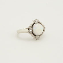 Ring with opal and diamondwith diamond (0.02 ct) in 14K White gold