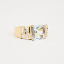Ring with and aquamarinewith diamond (0.44 ct) in 18K Gold size 6