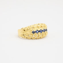 18K yellow gold statement ring with seven round-cut blue stones, Size 6¾