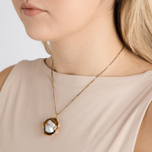 Pendant with and pearlwith diamond (0.21 ct) in 14K Gold, 1.57