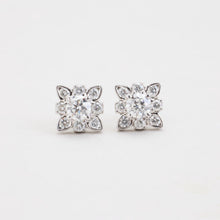Earrings with diamond (0.65 ct) in 18K White gold, 0.31 inches