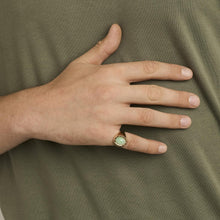 Signet-style ring in 14K yellow gold with bezel-set oval cabochon-cut mint green stone, Size 7¼