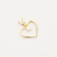 Pendant in 14K gold, with diamond (0.07 ct), length 1.5 cm