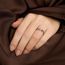 Ring with ruby and topazwith diamond (0.13 ct) in 14K White gold