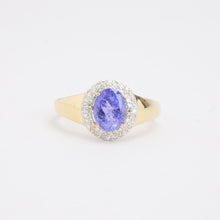 Ring with and tanzanitewith diamond (0.14 ct) in 14K Gold and white