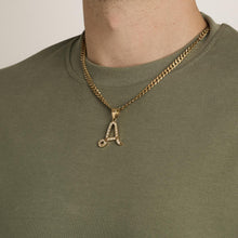 14K yellow gold pendant in stylized 'A' form with diamonds (0.92 ct), 1.69 inches