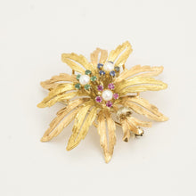 Brooch with pearl, ruby, sapphire and emerald in 18K Gold, white gold